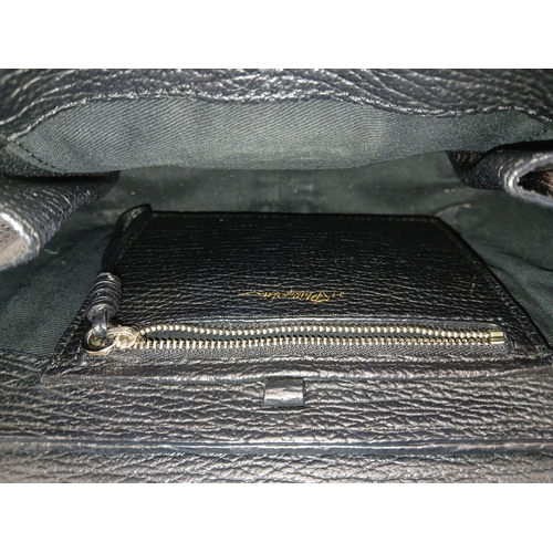 924 - A Phillip Lim black woven straw and leather medium Pashli Satchel. Silver hardware and front flap. T... 