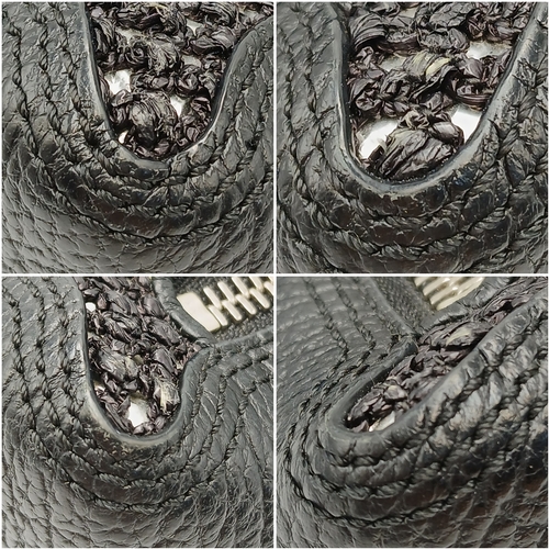 924 - A Phillip Lim black woven straw and leather medium Pashli Satchel. Silver hardware and front flap. T... 