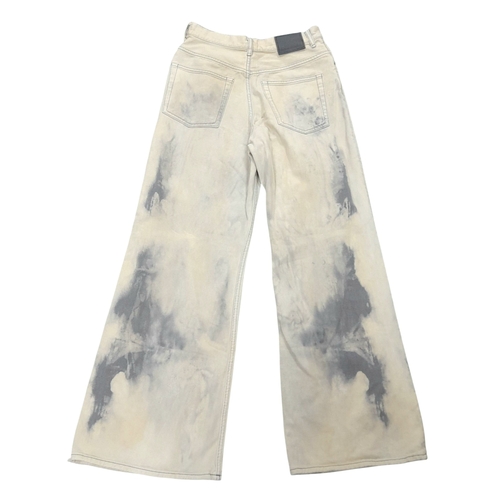 727 - A pair of Acne Studios beige washed denim jeans featuring a high rise waist and classic five-pocket ... 