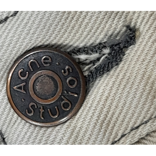 727 - A pair of Acne Studios beige washed denim jeans featuring a high rise waist and classic five-pocket ... 