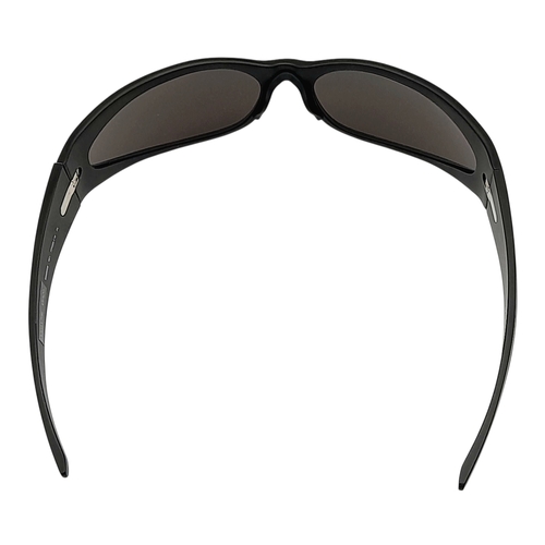 776 - A pair of Balenciaga black aluminium women's sunglasses. Total length 17cm. Comes with original case... 