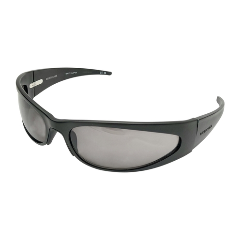 776 - A pair of Balenciaga black aluminium women's sunglasses. Total length 17cm. Comes with original case... 