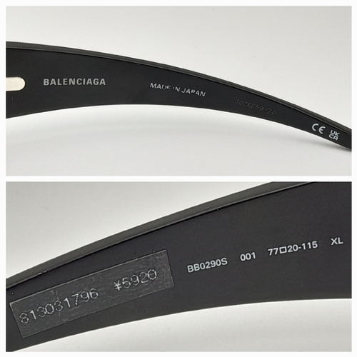 776 - A pair of Balenciaga black aluminium women's sunglasses. Total length 17cm. Comes with original case... 