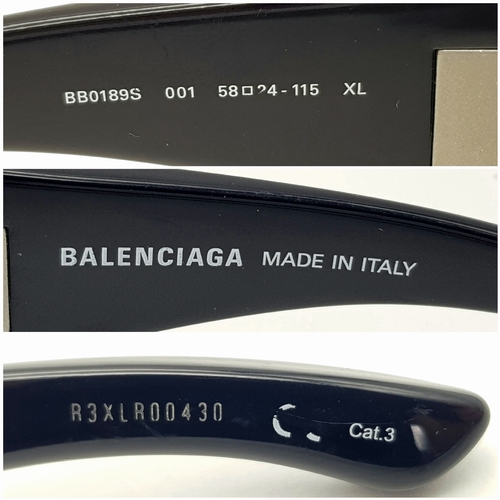 945 - A Pair of Balenciaga black metal sunglasses. Total length 16.5cm. Unworn, excellent condition. Ref J... 