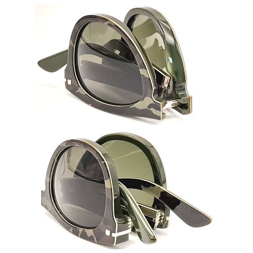 952 - A pair of Valentino Camouflage foldable sunglasses. Total length 15cm. Comes with COA and original c... 