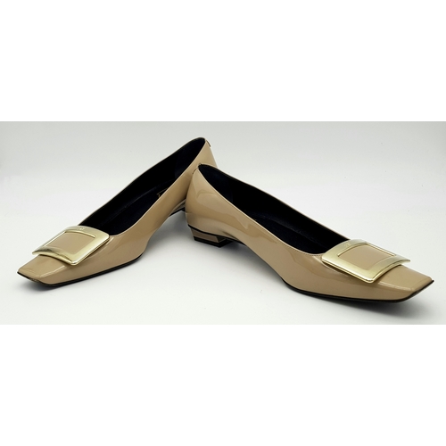 769 - A pair of Roger Vivier Belle Vivier patent leather pumps. Features a signature square toe with a lar... 