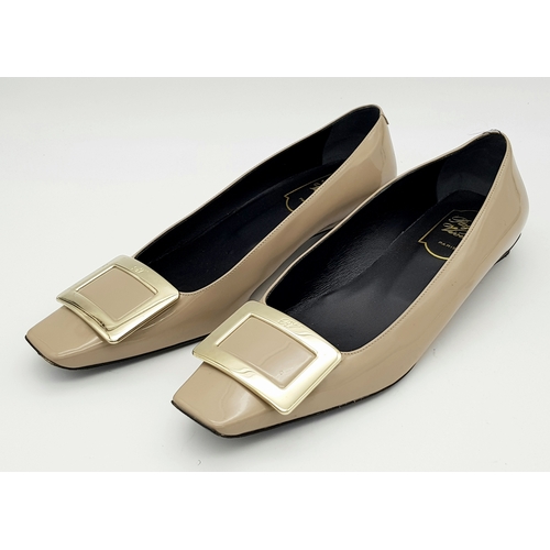 769 - A pair of Roger Vivier Belle Vivier patent leather pumps. Features a signature square toe with a lar... 