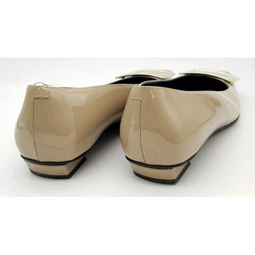 769 - A pair of Roger Vivier Belle Vivier patent leather pumps. Features a signature square toe with a lar... 
