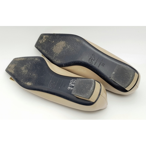 769 - A pair of Roger Vivier Belle Vivier patent leather pumps. Features a signature square toe with a lar... 