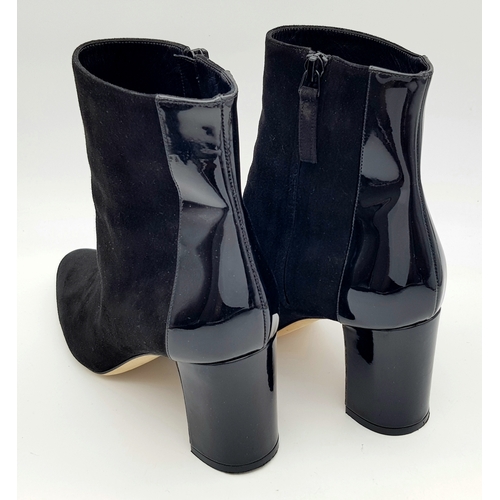 762 - A Pair of Manolo Blahnik Black Suede Ankle Boots with Patent Leather Block Heels. Pointed-toe ankle ... 
