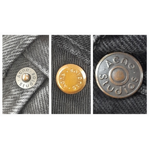 741 - A pair of Acne Studios black denim jeans. Designed with a classic five-pocket layout and zip fly. Eu... 
