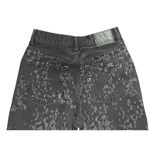 741 - A pair of Acne Studios black denim jeans. Designed with a classic five-pocket layout and zip fly. Eu... 