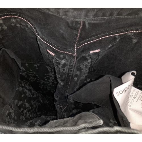 741 - A pair of Acne Studios black denim jeans. Designed with a classic five-pocket layout and zip fly. Eu... 