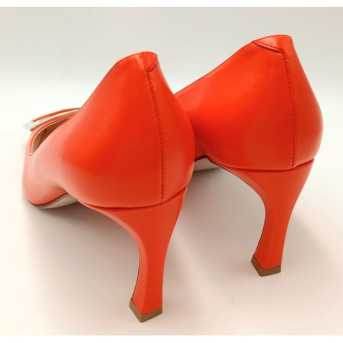 636 - A pair of Roger Vivier bold red patent leather Pumps. Features a square toe and oversized metal buck... 