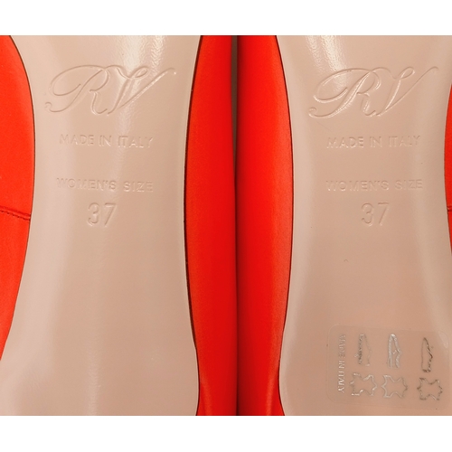 636 - A pair of Roger Vivier bold red patent leather Pumps. Features a square toe and oversized metal buck... 