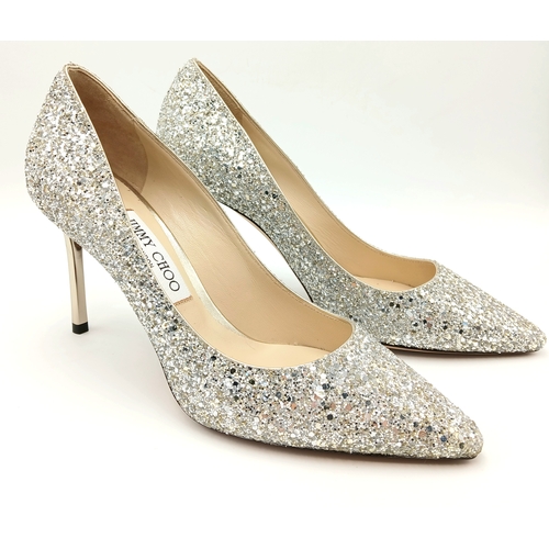 748 - A dazzling pair of Jimmy Choo champange coarse glitter fabric pointed pumps. Size 38/UK size 5. Come... 