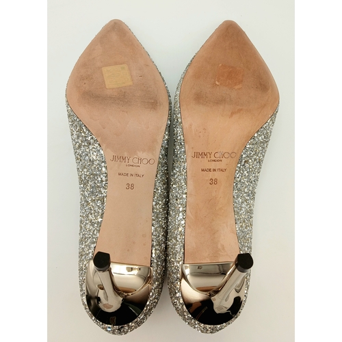 748 - A dazzling pair of Jimmy Choo champange coarse glitter fabric pointed pumps. Size 38/UK size 5. Come... 