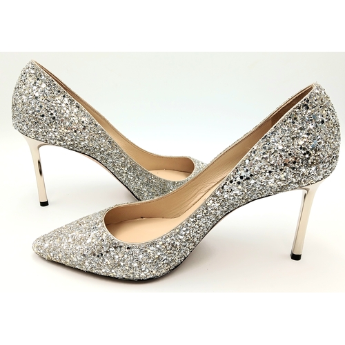 748 - A dazzling pair of Jimmy Choo champange coarse glitter fabric pointed pumps. Size 38/UK size 5. Come... 