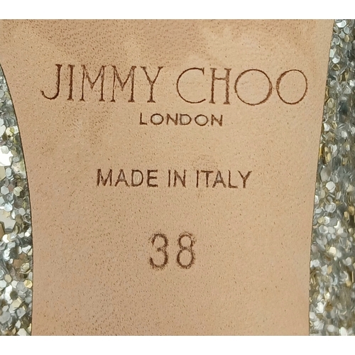 748 - A dazzling pair of Jimmy Choo champange coarse glitter fabric pointed pumps. Size 38/UK size 5. Come... 