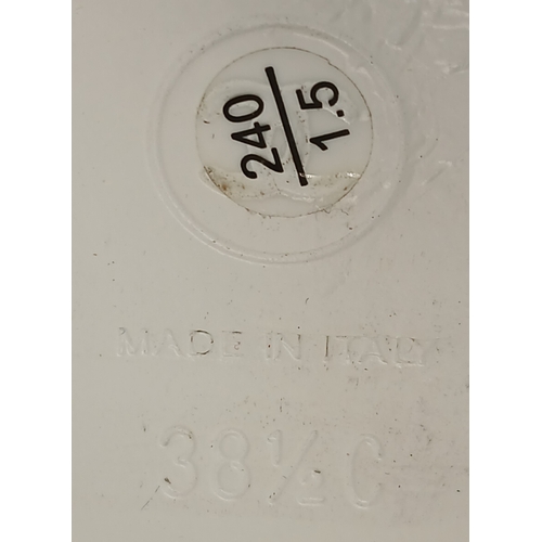 594 - A pair of Chanel White Patent Leather Chain Loafers. Gold-tone CC charm and chain detail across the ... 