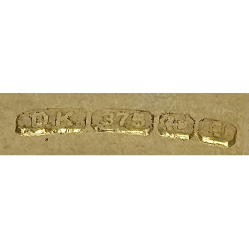 643 - A 9K Yellow Gold Blue Zircon and White Topaz Ring. 0.957ct Cambodian oval cut centre stone with 0.06... 