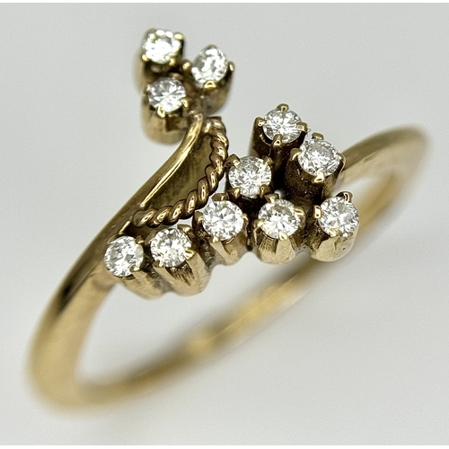 588 - A 14K Yellow Gold Diamond Abstract Ring. Size M. 2.79g.  Ref: 23/61005.