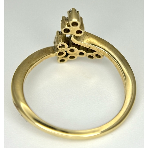 588 - A 14K Yellow Gold Diamond Abstract Ring. Size M. 2.79g.  Ref: 23/61005.