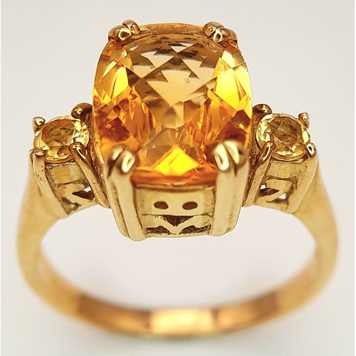 650 - A 9K Yellow Gold Citrine Ring. 2.316ct Antique cut centre stone with small round cut citrine accents... 