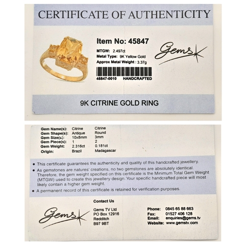 650 - A 9K Yellow Gold Citrine Ring. 2.316ct Antique cut centre stone with small round cut citrine accents... 