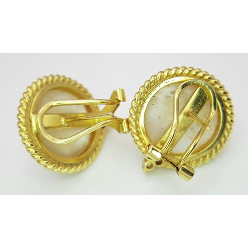 546 - A Pair of 18K Yellow Gold, Mabe Pearl and Diamond Earrings. Beautiful pearl cabochons each with thre... 