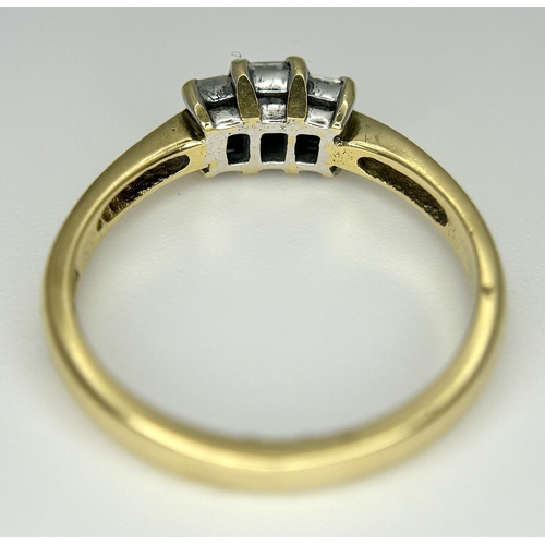 560 - An 18K Yellow Gold Emerald Cut Diamond Trilogy Ring. c. 0.50ctw. Size O. 3.45g. Ref: 18/82205.