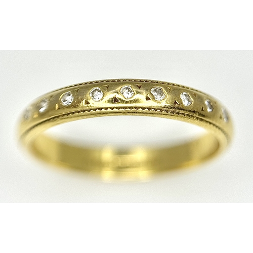 608 - An 18K Yellow Gold and Diamond Half Eternity Ring. Size K. 2.5g. Ref: NL-1161405.