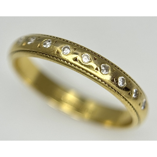 608 - An 18K Yellow Gold and Diamond Half Eternity Ring. Size K. 2.5g. Ref: NL-1161405.