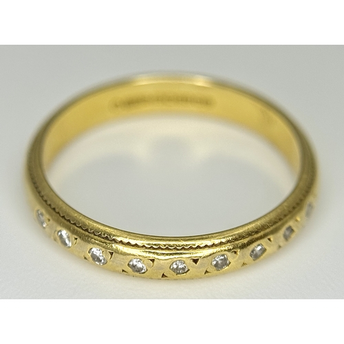 608 - An 18K Yellow Gold and Diamond Half Eternity Ring. Size K. 2.5g. Ref: NL-1161405.