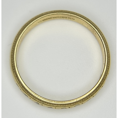 608 - An 18K Yellow Gold and Diamond Half Eternity Ring. Size K. 2.5g. Ref: NL-1161405.