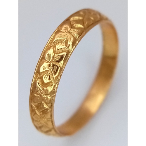160 - An Antique 22K Yellow Gold (tests as) Band Ring. Geometric pattern design. 4mm width. Size O 1/2. 3.... 