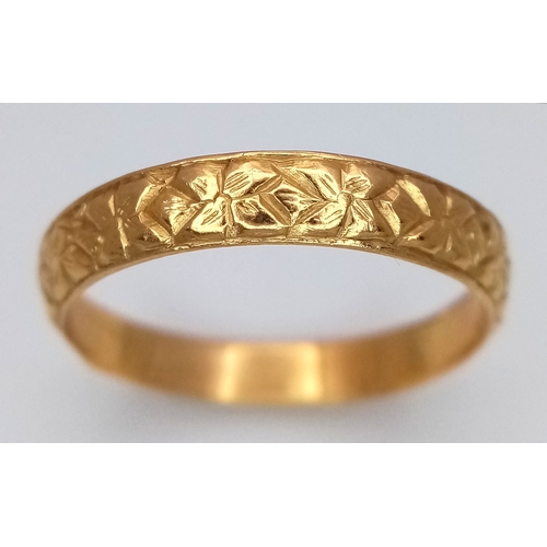 160 - An Antique 22K Yellow Gold (tests as) Band Ring. Geometric pattern design. 4mm width. Size O 1/2. 3.... 
