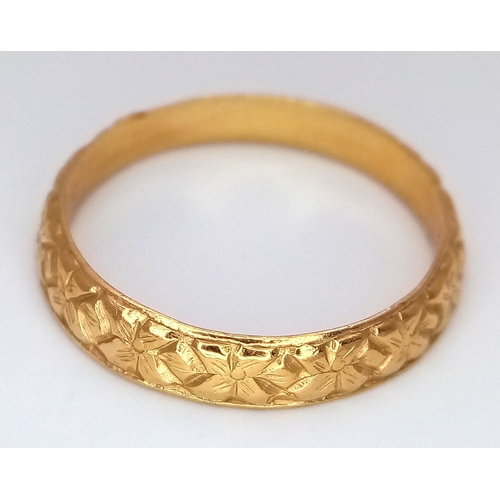 160 - An Antique 22K Yellow Gold (tests as) Band Ring. Geometric pattern design. 4mm width. Size O 1/2. 3.... 