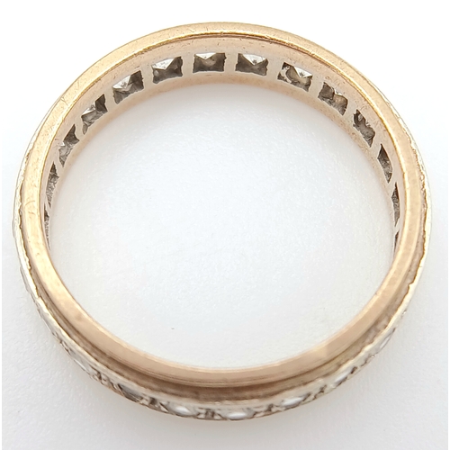 571 - A 9K Gold White Stone Eternity Ring. 2.6g. Size K.