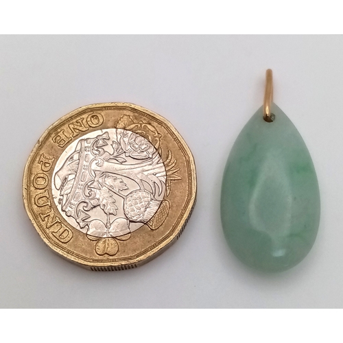 626 - A Pear Shaped  jade Pendant with 9K (tests as) Bail. 
3cm.