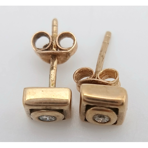 737 - A Pair of 9K Yellow Gold and Diamond Stud Earrings. 1.57g.