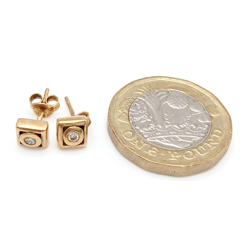 737 - A Pair of 9K Yellow Gold and Diamond Stud Earrings. 1.57g.