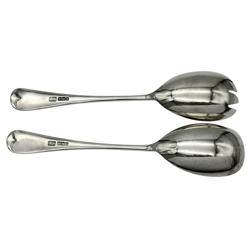 859 - An antique sterling silver set of salad servers fork and a spoon. Full Sheffield hallmarks, 1919. To... 