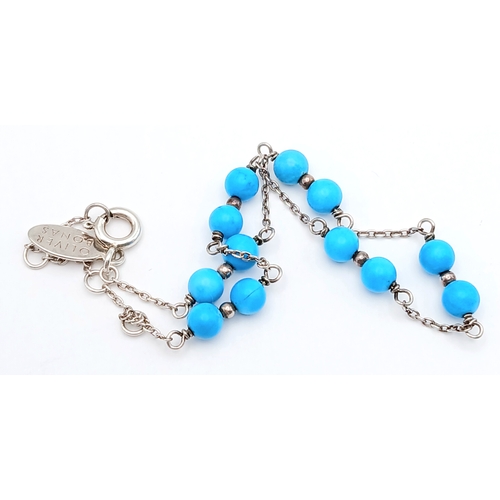 891 - A pretty Oliver Bonas 925 silver Turquoise link bracelet. Total weight 2.6G. Maximum length 22cm.