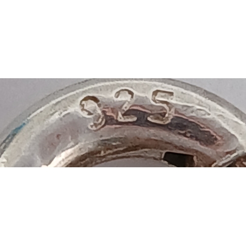 891 - A pretty Oliver Bonas 925 silver Turquoise link bracelet. Total weight 2.6G. Maximum length 22cm.