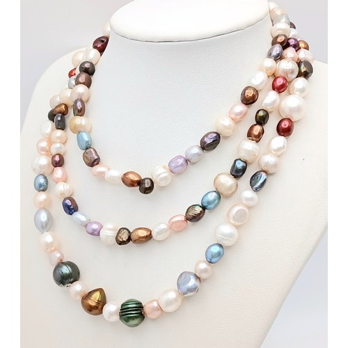 898 - A beautiful rope length single strand of multi-color  Pearls necklace. Total length 115cm.