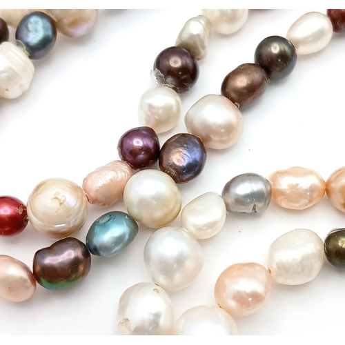 898 - A beautiful rope length single strand of multi-color  Pearls necklace. Total length 115cm.
