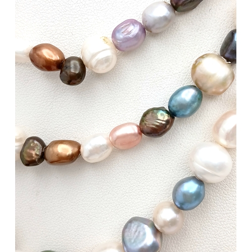 898 - A beautiful rope length single strand of multi-color  Pearls necklace. Total length 115cm.