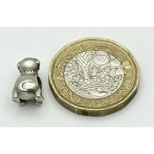 832 - A PANDORA STERLING SILVER PUPPY DOG CHARM. TOTAL WEIGHT 2.5G. SC 8103