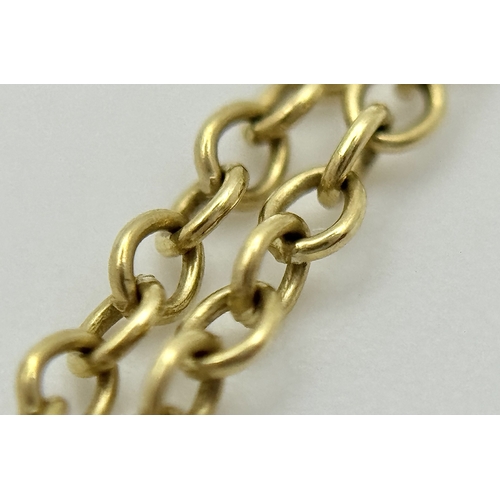 825 - A 9K Yellow Gold Diamond Pendant on a 9K Yellow Gold Chain. 1cm and 40cm. 2.5g. NL-27/61505.